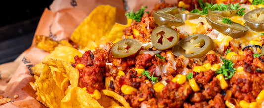 Ultimate Loaded Nachos Recipe with Ground Beef, Cheese & Jalapeños